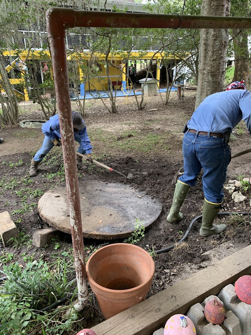 Septic repair technician at work